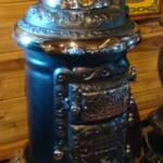 Very rare hard to find Round Oak E-12'' Stove. Restored with a small three feathered Indian finial
$4250